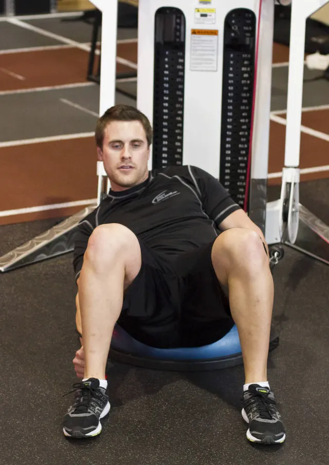 Bosu Ball Cable Crunch With Side Bends, finishing position