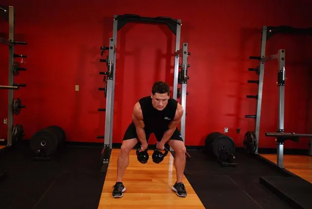 Double Kettlebell Snatch, finishing position