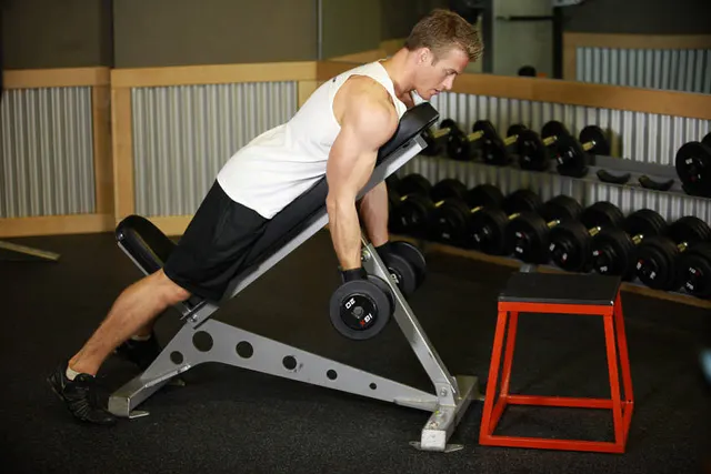 Dumbbell Prone Incline Curl, finishing position
