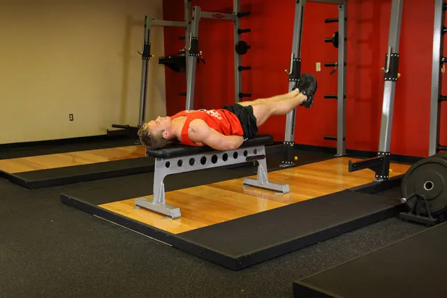 Flat Bench Leg Pull-In, finishing position