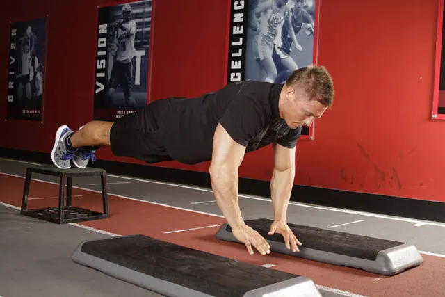 Incline Push-Up Depth Jump, finishing position