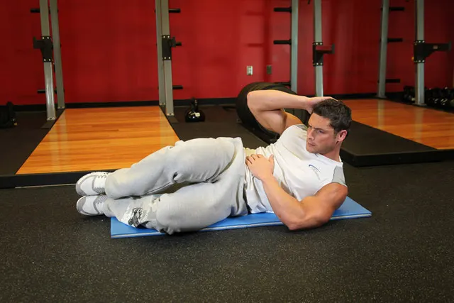 Oblique Crunches - On The Floor, finishing position