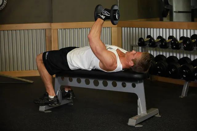 One-Arm Flat Bench Dumbbell Flye, finishing position