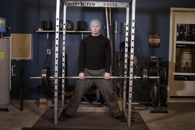 Reverse Band Sumo Deadlift, finishing position