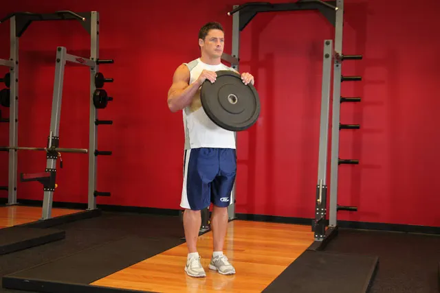Reverse Plate Curls, finishing position