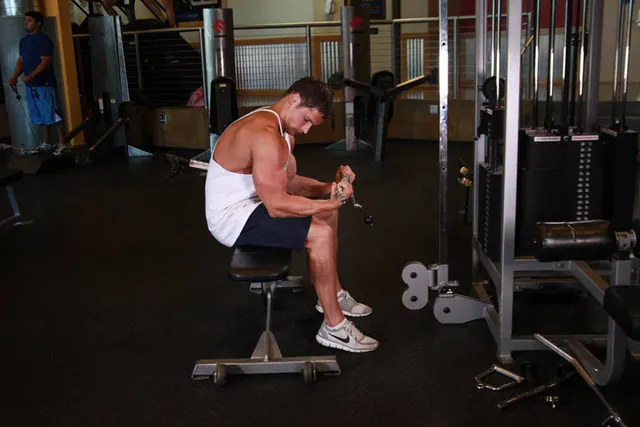 Seated Two-Arm Palms-Up Low-Pulley Wrist Curl, finishing position