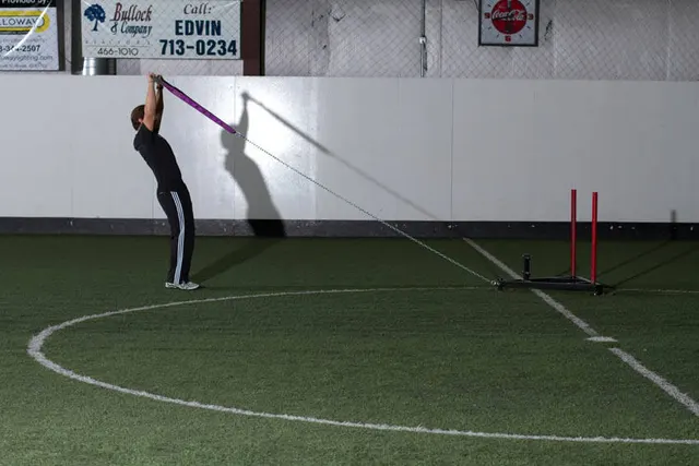 Sled Overhead Backward Walk, finishing position