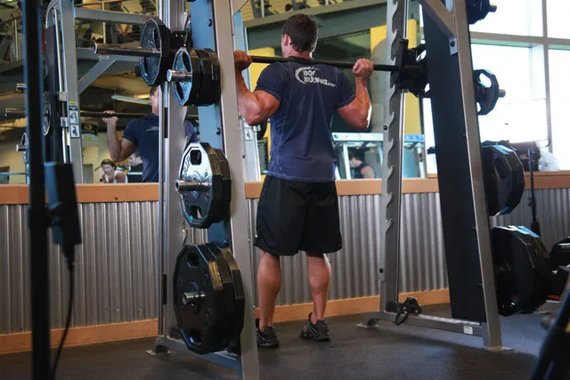 Smith Machine Squat, finishing position