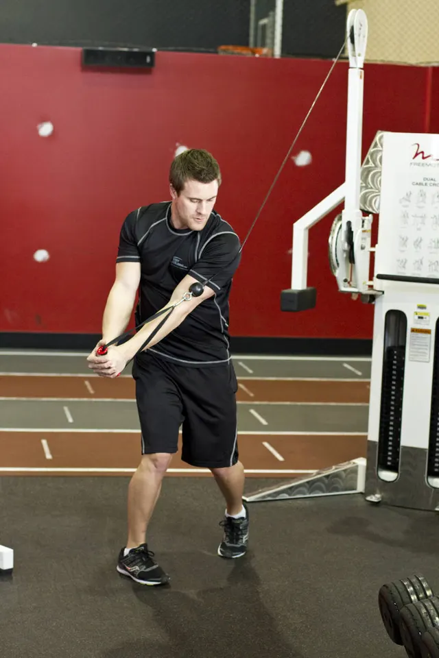 Standing Cable Wood Chop, finishing position