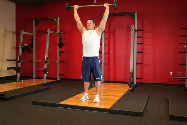 Standing Military Press, finishing position