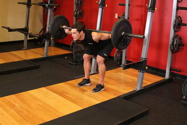 Stiff Leg Barbell Good Morning, finishing position