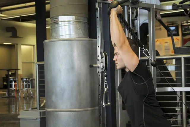Triceps Overhead Extension with Rope, finishing position