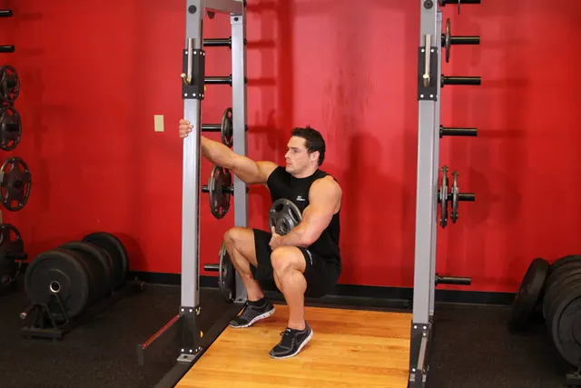 Weighted Sissy Squat, finishing position